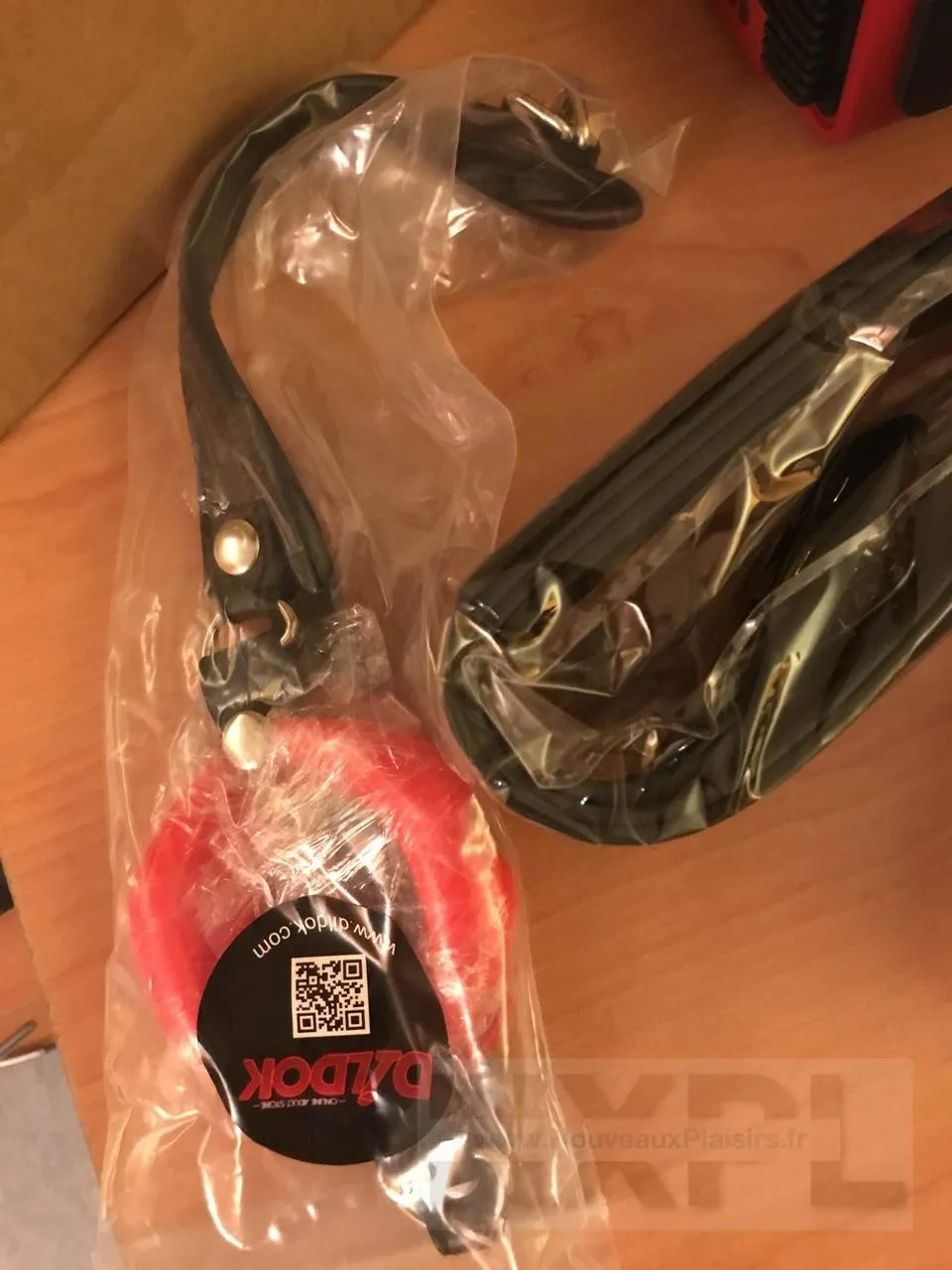 Bâillon lèvres rouges de Concept Leather pour Dildok.com dans son emballage plastique