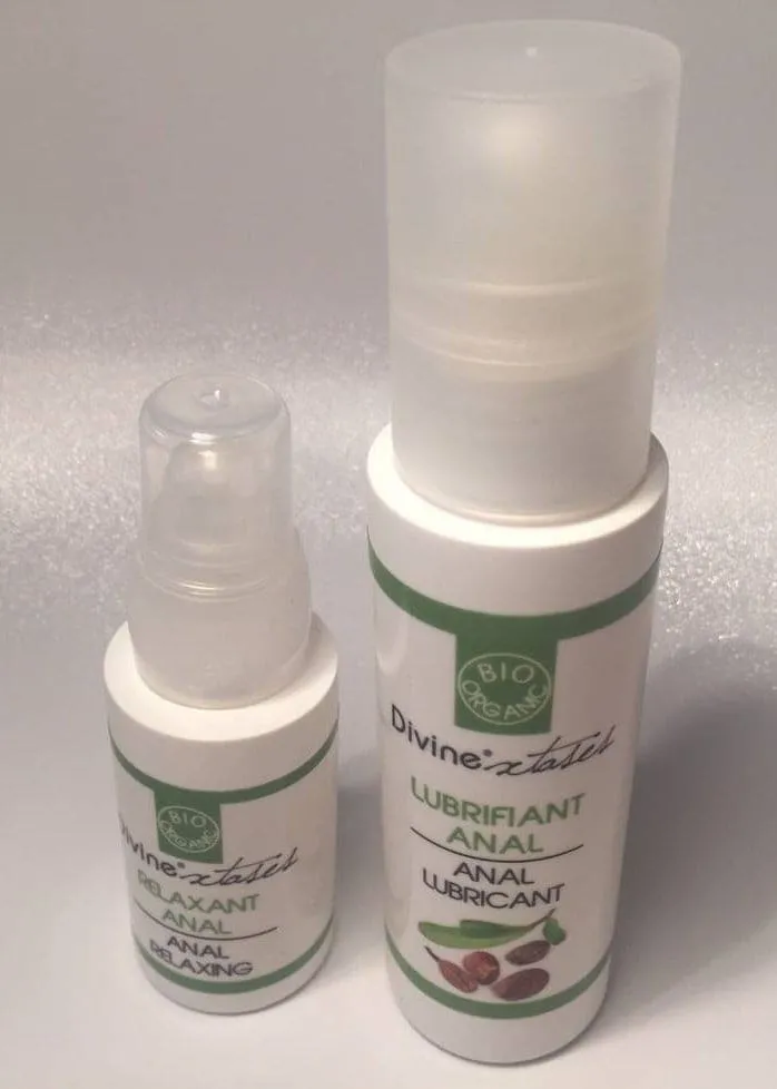 Bouteilles du lubrifiant et du relaxant anal bio Divinextases
