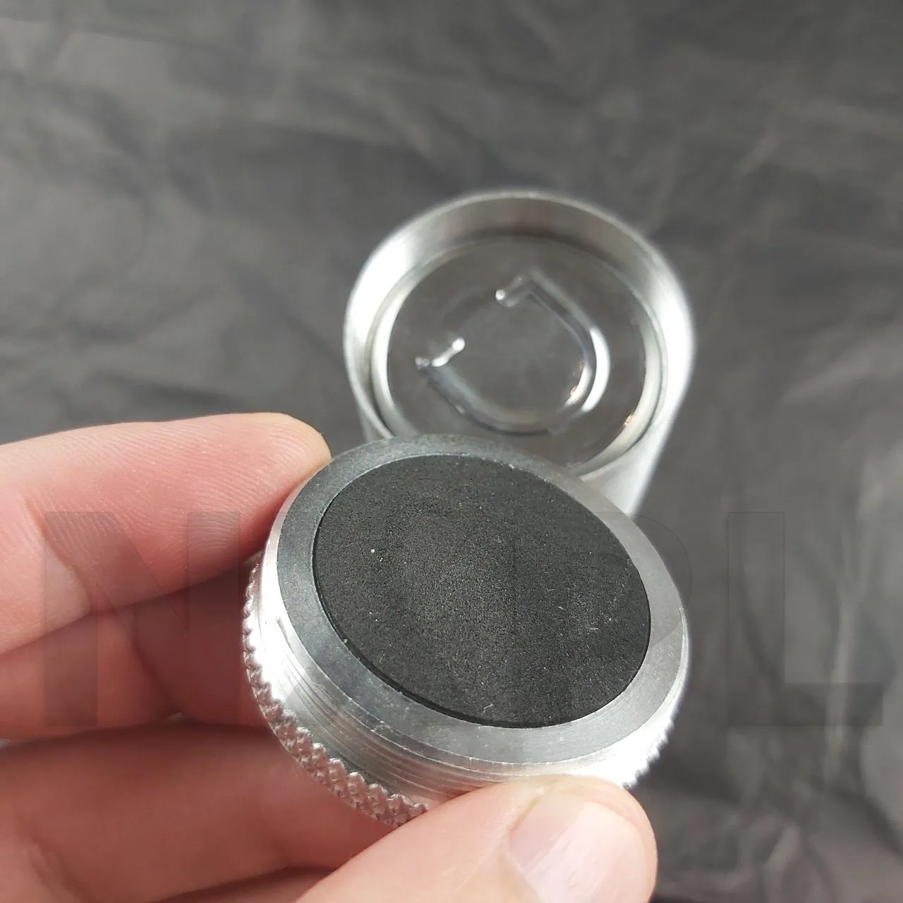 Détail du bouchon du tube de rangement Doxy