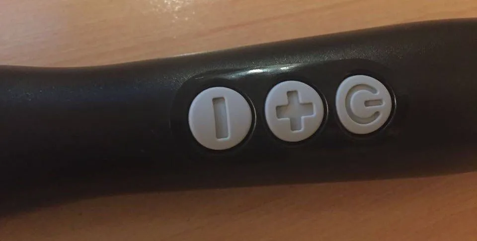 Boutons de commande + et - du Doxy Wand Massager