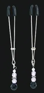 Le modèle de pinces à seins Spartacus testé avec des perles