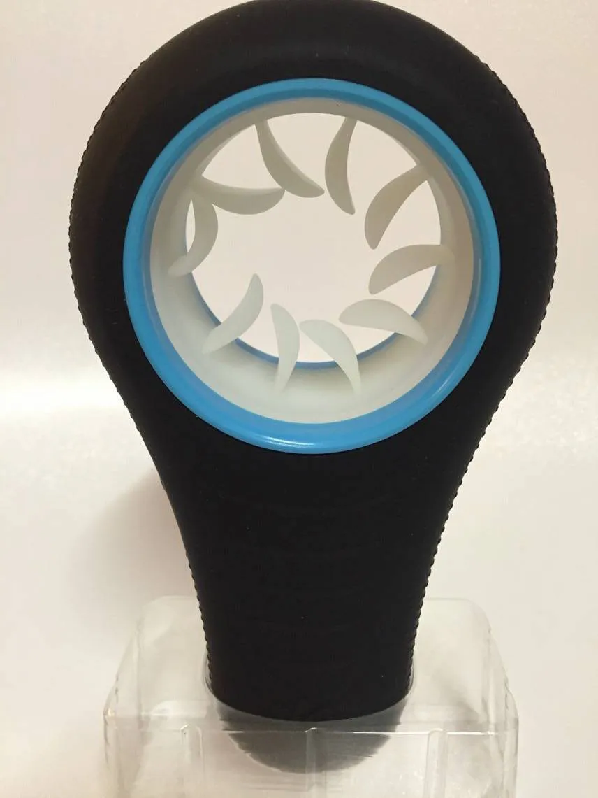 Vue de profil du Sqweel XT montrant les boutons de contrôle et la zone de stimulation