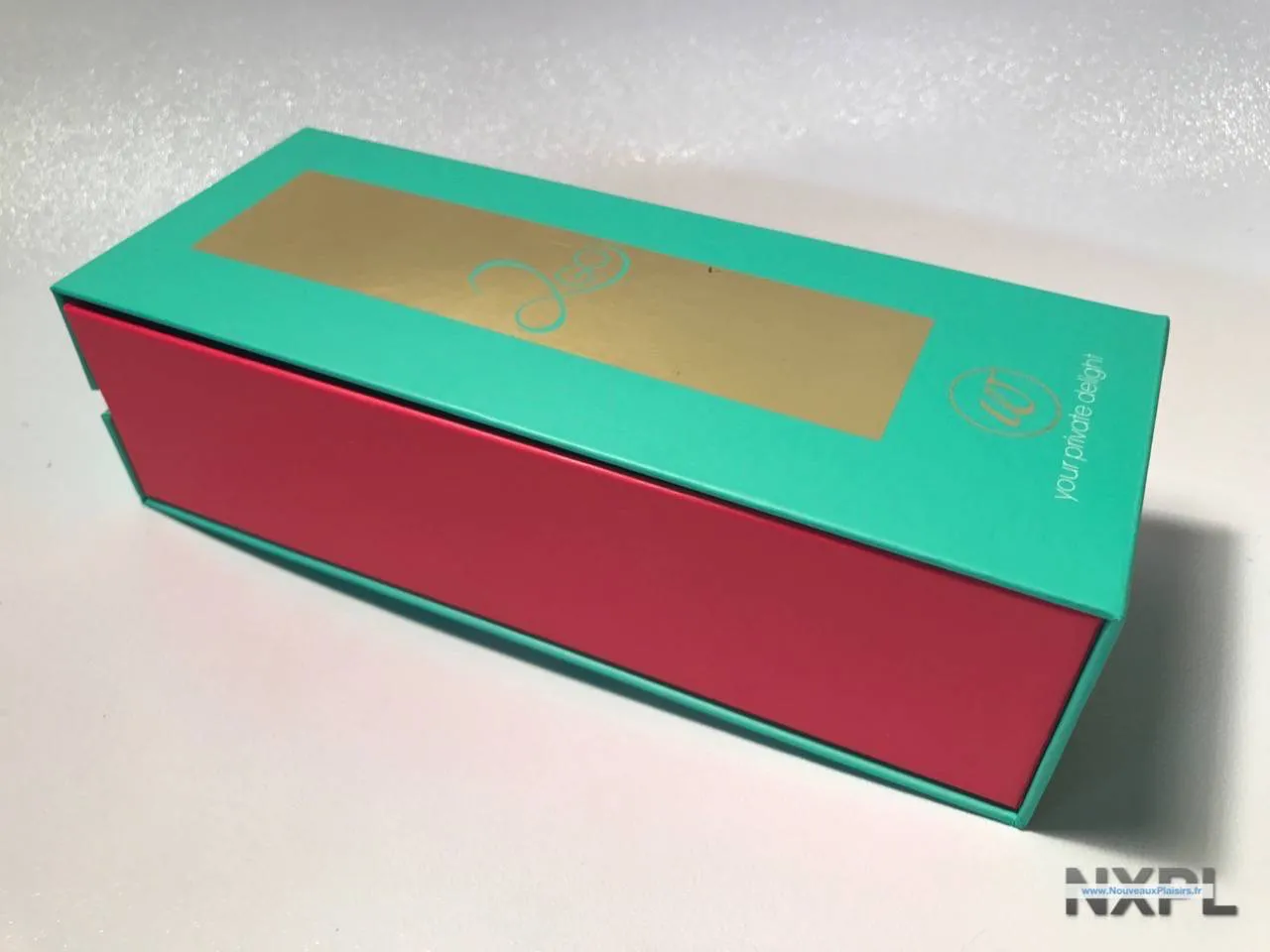 Boîte du Womanizer 2Go, design rose et or