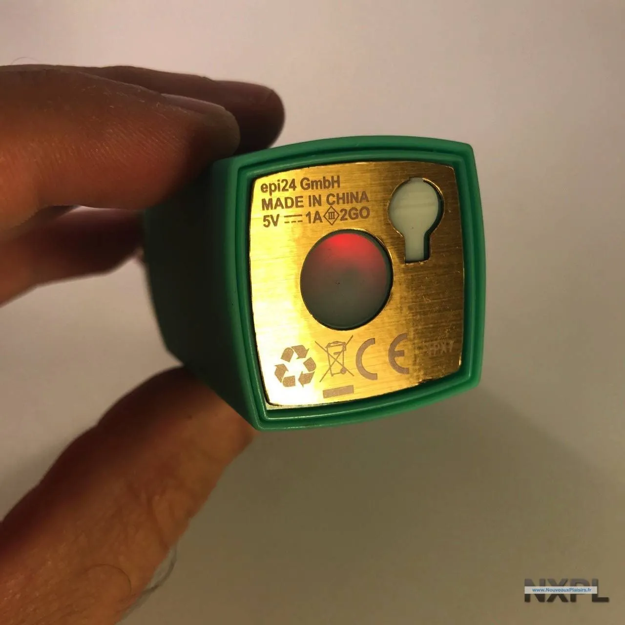 Bouton de marche du Womanizer 2Go allumé en rouge