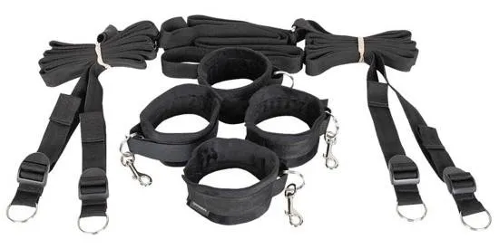 Vue d'ensemble du kit d'entraves de lit Sportsheets avec sangles et bracelets